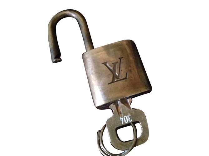 Louis Vuitton Lock number 304 Copper Steel ref.74205 - Joli Closet