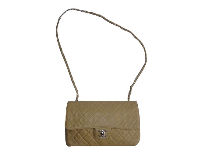 Chanel Handbags Beige Leather  ref.75206