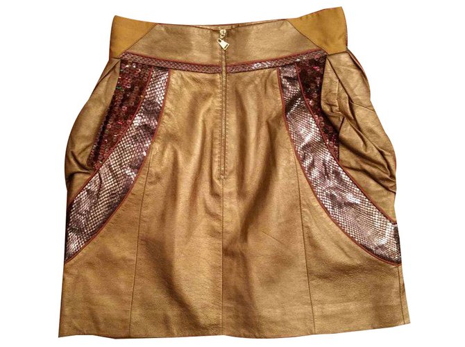 Louis Vuitton Mini skirt Golden Leather  ref.75224