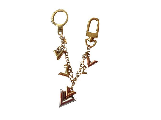 Louis Vuitton Encantos de saco Dourado Metal  ref.75334