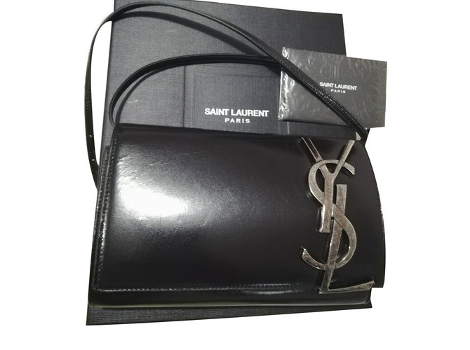 Yves Saint Laurent Clutch-Taschen Schwarz Leder  ref.76518