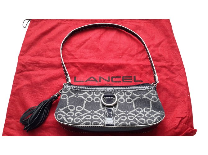 Lancel Clutch bags Blue Leather  ref.77632