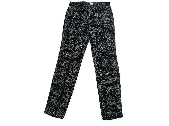 Vaqueros Moschino Negros de Algodón con Corazón Blanco