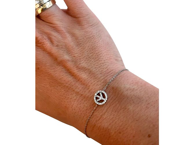 Bracciale Messika Peace and Love in oro bianco e diamanti Argento