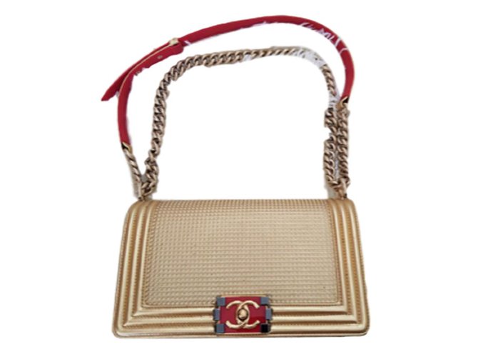 Chanel Dubai Gold Medium Boy bag Golden Leather  ref.79755