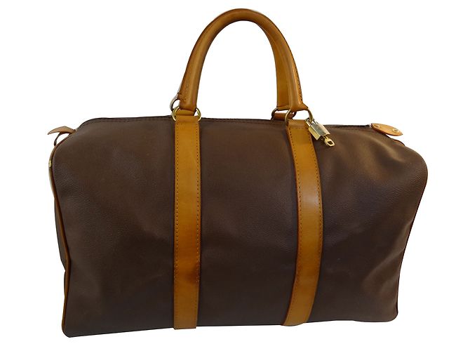 Borsa da viaggio Chanel in pelle granulata marrone