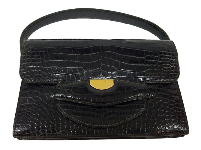 Hermès Sac vintage en crocodile noir Cuirs exotiques  ref.82448