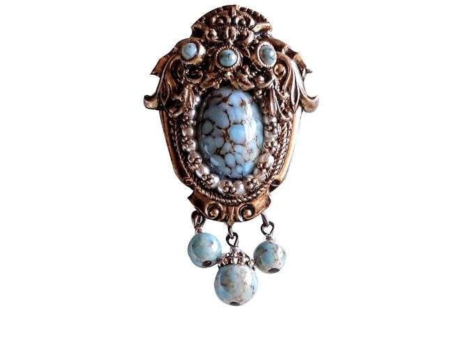 Broche inconnue de bronce y turquesa natural
