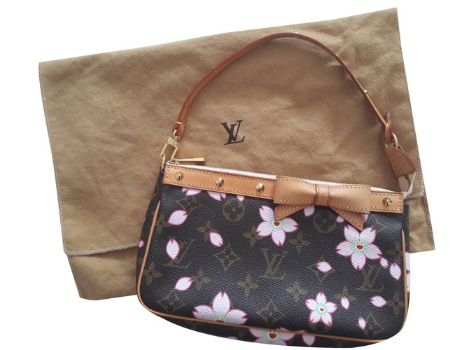 Louis Vuitton Clutch bags Brown Cloth  ref.83709