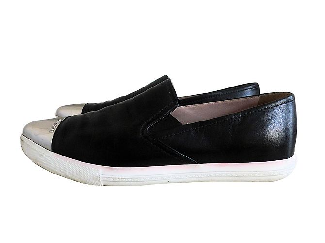 Mocassini Miu Miu in pelle nero argento