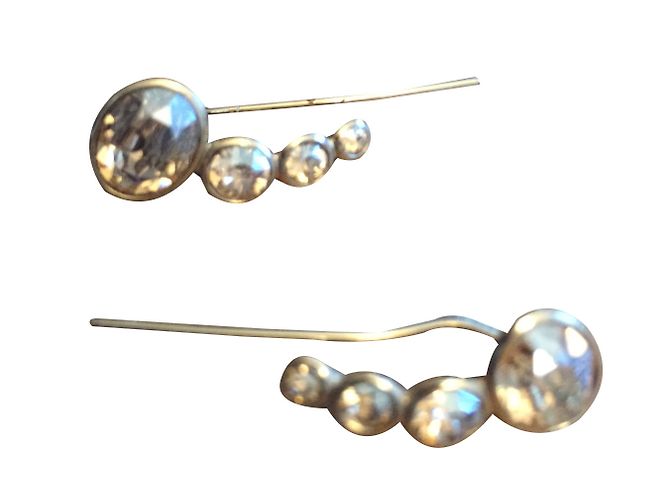 Boucles d'oreilles Dior dorées avec pierres