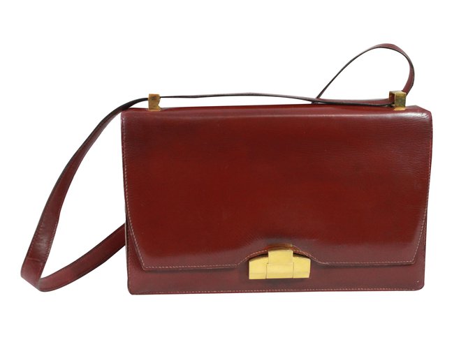 Hermès Handbags Dark red Leather  ref.88952