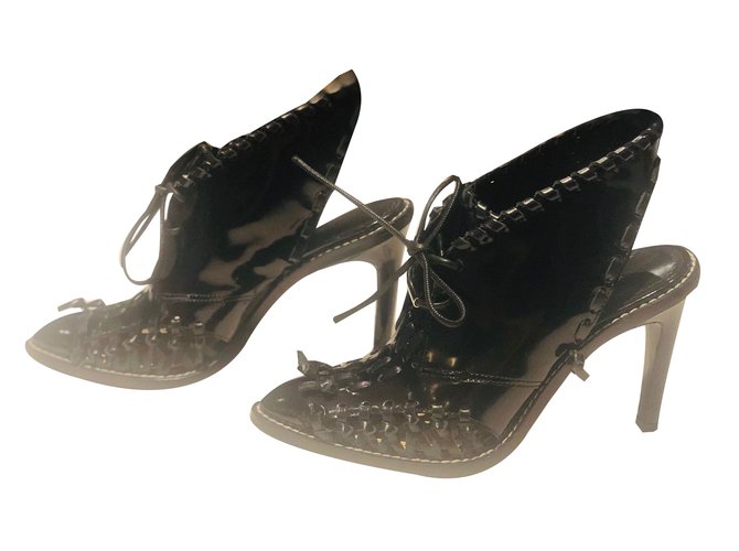 Louis Vuitton Edição de mangá preto de botas baixas Couro envernizado  ref.89026