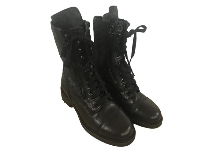 Chanel boots Black Leather  ref.90989