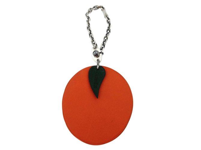 Charm Hermès Motivo de Fruta Laranja em couro e corrente de metal 