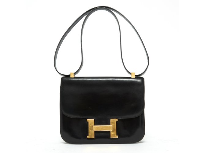 Hermès CONSTANCE BLACK GOLD Leather  ref.93010