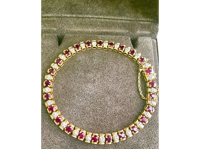 Autre Marque Bracciale in oro con rubini e diamanti D'oro