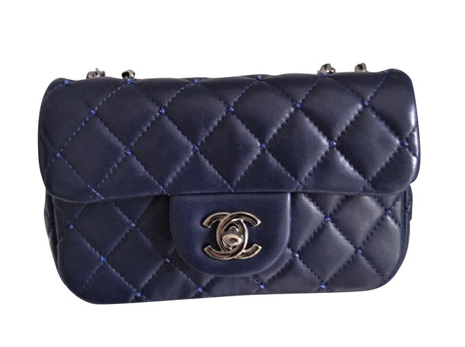 Limited edition Chanel Navy blue mini flap bag with swarovski beads Leather  ref.99381 - Joli Closet