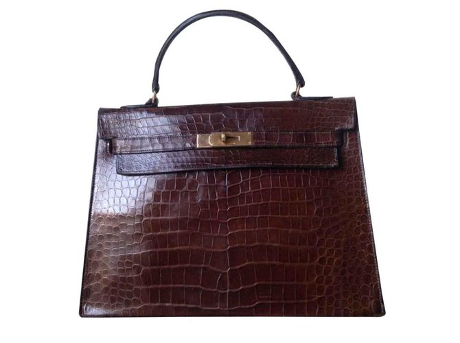 Hermès Kelly Brown Exotic leather  ref.101570