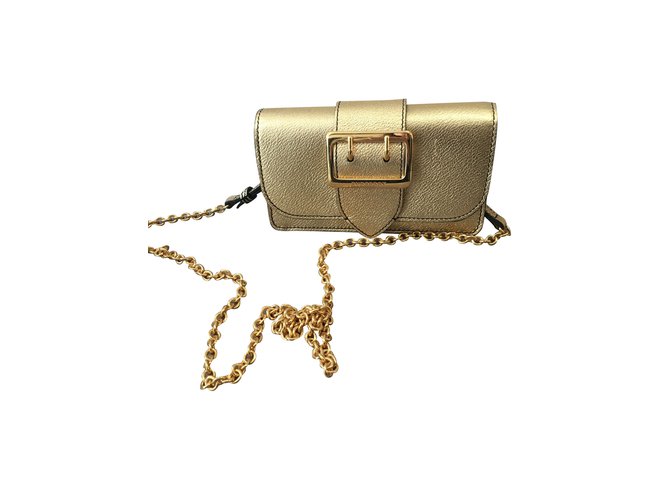 Burberry Clutch bags Golden Leather  ref.101757