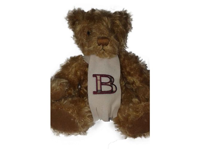 Bellissimo peluche Burberry con sciarpa