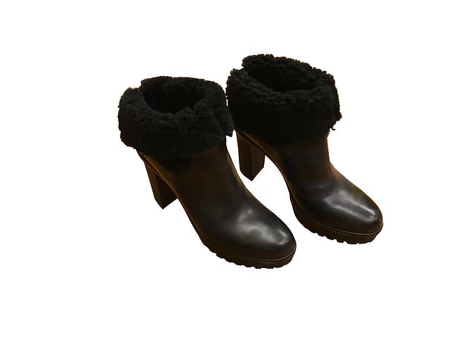 Moncler Black boots in fur interior