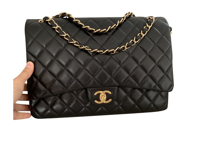 Timeless Chanel Maxi Jumbo black Leather ref.103438 - Joli Closet