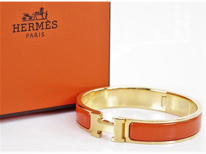 Hermès Click Clack H Pulseira Banhada a Ouro e Esmalte Laranja Banhado a ouro  ref.104363