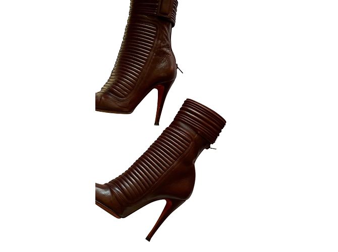 Botines Christian Louboutin de piel rojo oscuro Burdeos