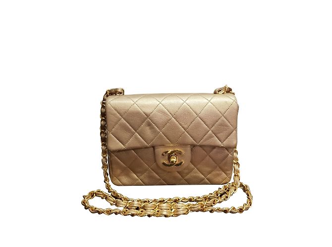 Timeless Chanel couro dourado intemporal