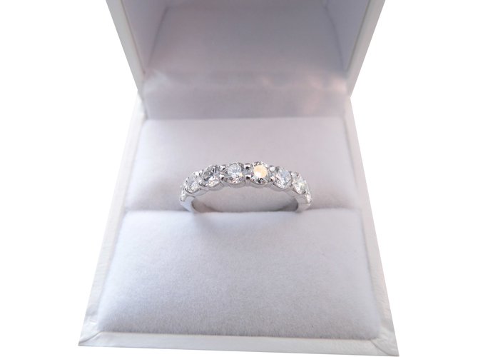 Autre Marque half white gold wedding band 18rhodium decorated with 8 diamonds 1,10 cts approx  ref.99848
