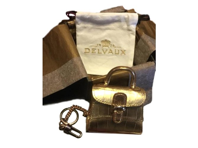 Delvaux Bag charm dust of stars Golden Exotic leather  ref.105983