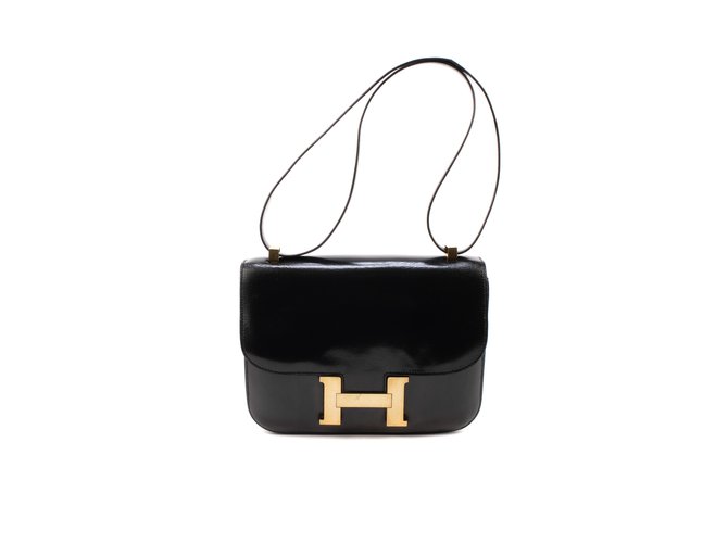 Hermès Hermes Constance em caixa de couro preto em bom estado!  ref.106466