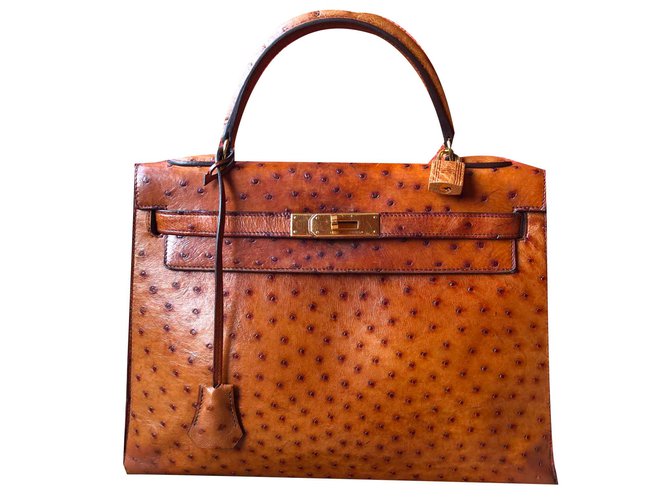 Hermès Kelly Conhaque Couros exóticos  ref.106643