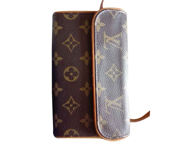 Louis Vuitton Clutch bags Brown Cloth  ref.108538