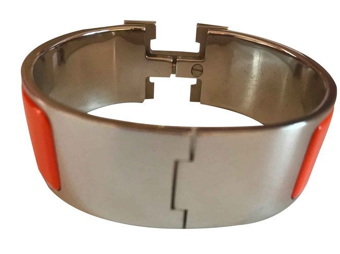 Bracelet Clic Clac H orange et palladium Hermès  ref.108683