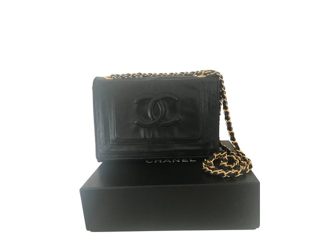 Chanel Mini saco Preto Couro  ref.110751