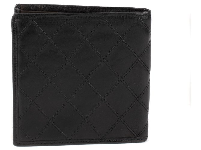 Chanel wallet in black quilted lambskin leather in good condition!  ref.111888