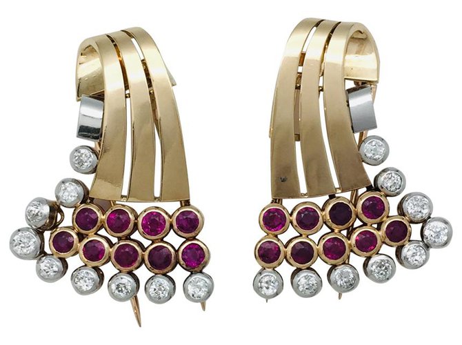 inconnue lined clip,"Swirls", two golds, rubies and diamonds. White gold Yellow gold  ref.113044