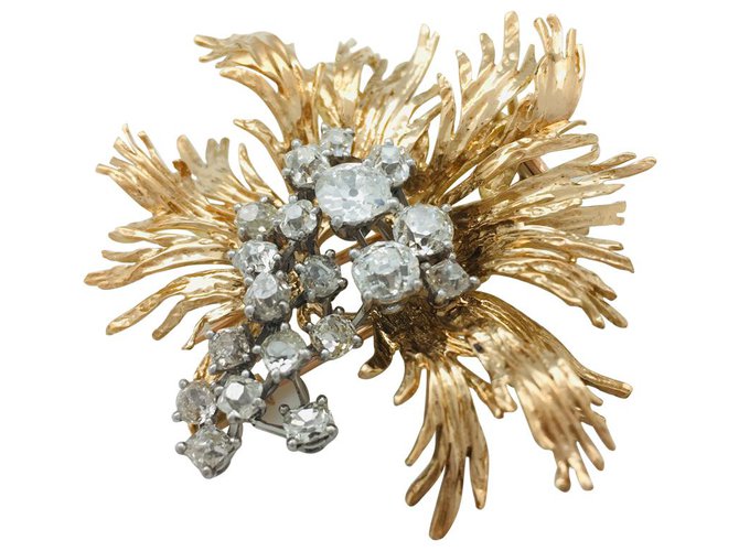 Broche Chaumet en or jaune et platine, diamants.  ref.113078