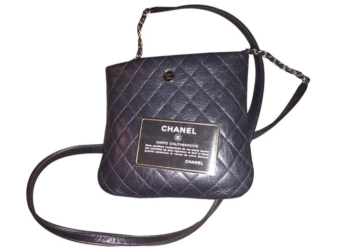 Chanel clutch Negro Cuero  ref.113390