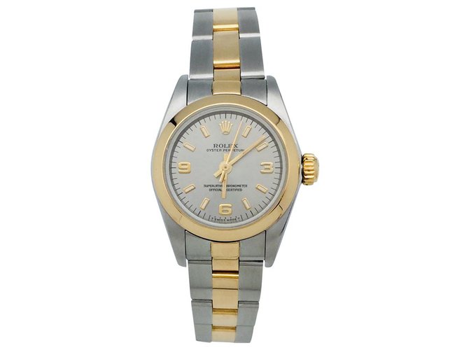 Rolex "Oyster Perpetual" Armbanduhr aus Stahl und Gelbgold.  ref.113474