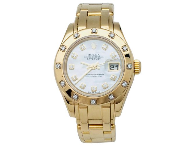 Montre femme Rolex modèle "Pearl Master" en or jaune, nacre et diamants.  ref.114866