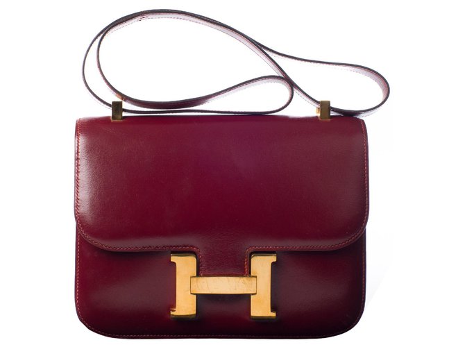 Hermès Soberba caixa de couro Hermes Constance Borgonha em muito bom estado! Bordeaux  ref.115450