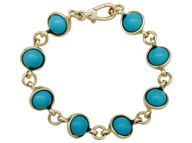 Bracelet Pomellato, or jaune et boules turquoises.  ref.115700