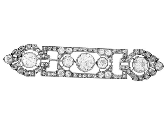 Art Deco Mauboussin brooch in platinum and diamonds.  ref.115720