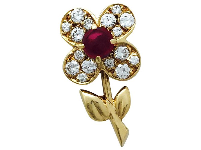 Clip vintage Van Cleef & Arpels, Colección "fleurette", Oro amarillo, diamantes y rubíes. Oro blanco  ref.115724