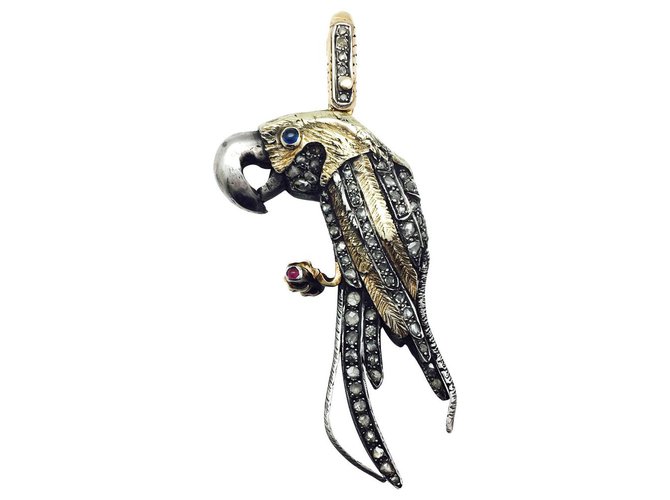 inconnue "Parrot" pendant in yellow and silver gold, ruby, sapphires and diamonds. Yellow gold  ref.115786