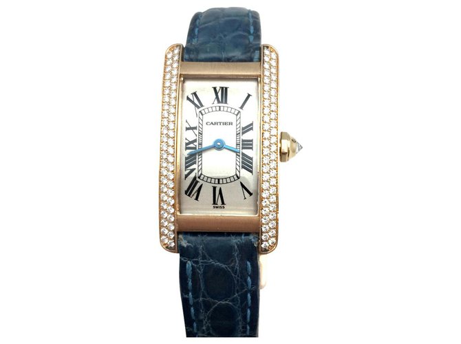 Cartier modelo "Tank Americaine" relógio em ouro amarelo, diamantes. Couro  ref.115797
