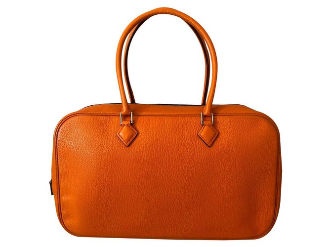 Hermès Feder Orange Leder  ref.116373